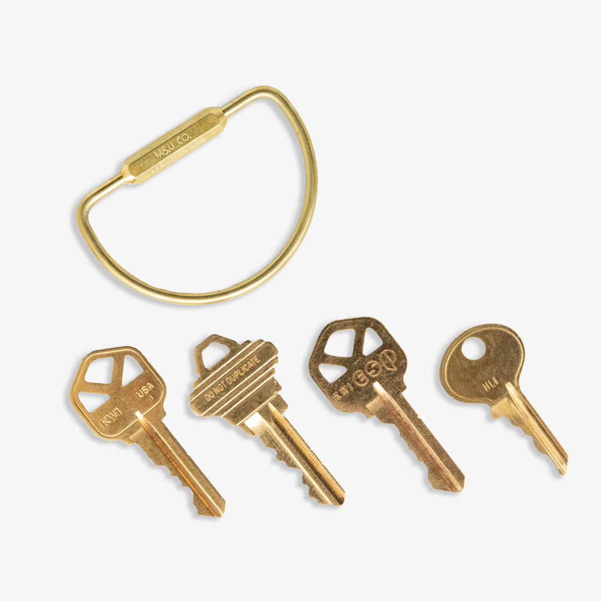 Maxx &amp; Unicorn D Keyring Brass